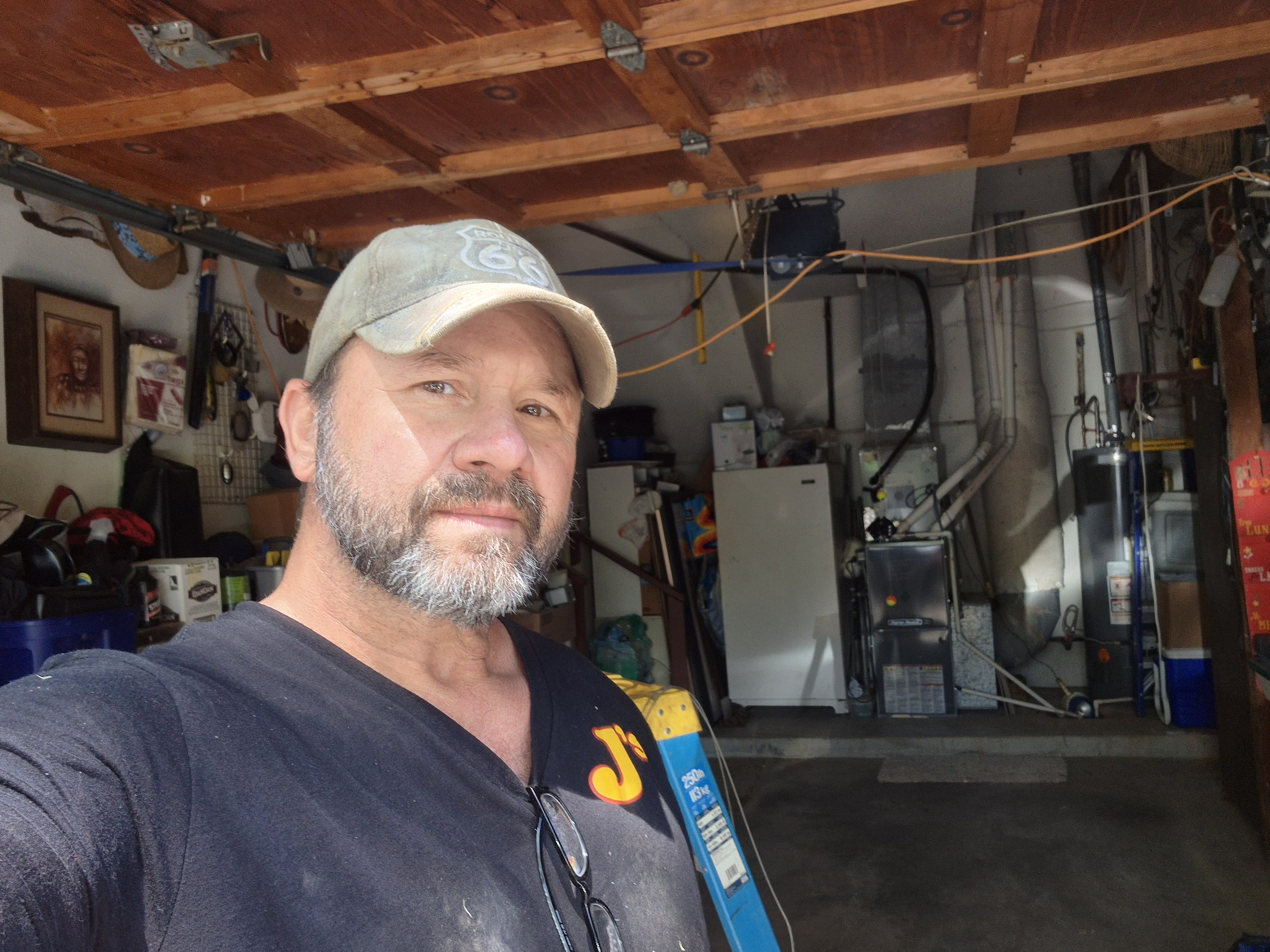 J's Overhead Door technician for loud garage door repair in Sand Springs, OK